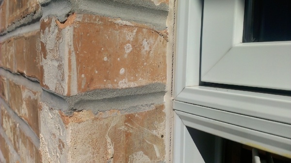 Figure 9: This sealant joint prematurely failed because there was no room to install a backer rod for a properly formed sealant joint. Designers should draw and dimension a gap on all four sides of windows.  