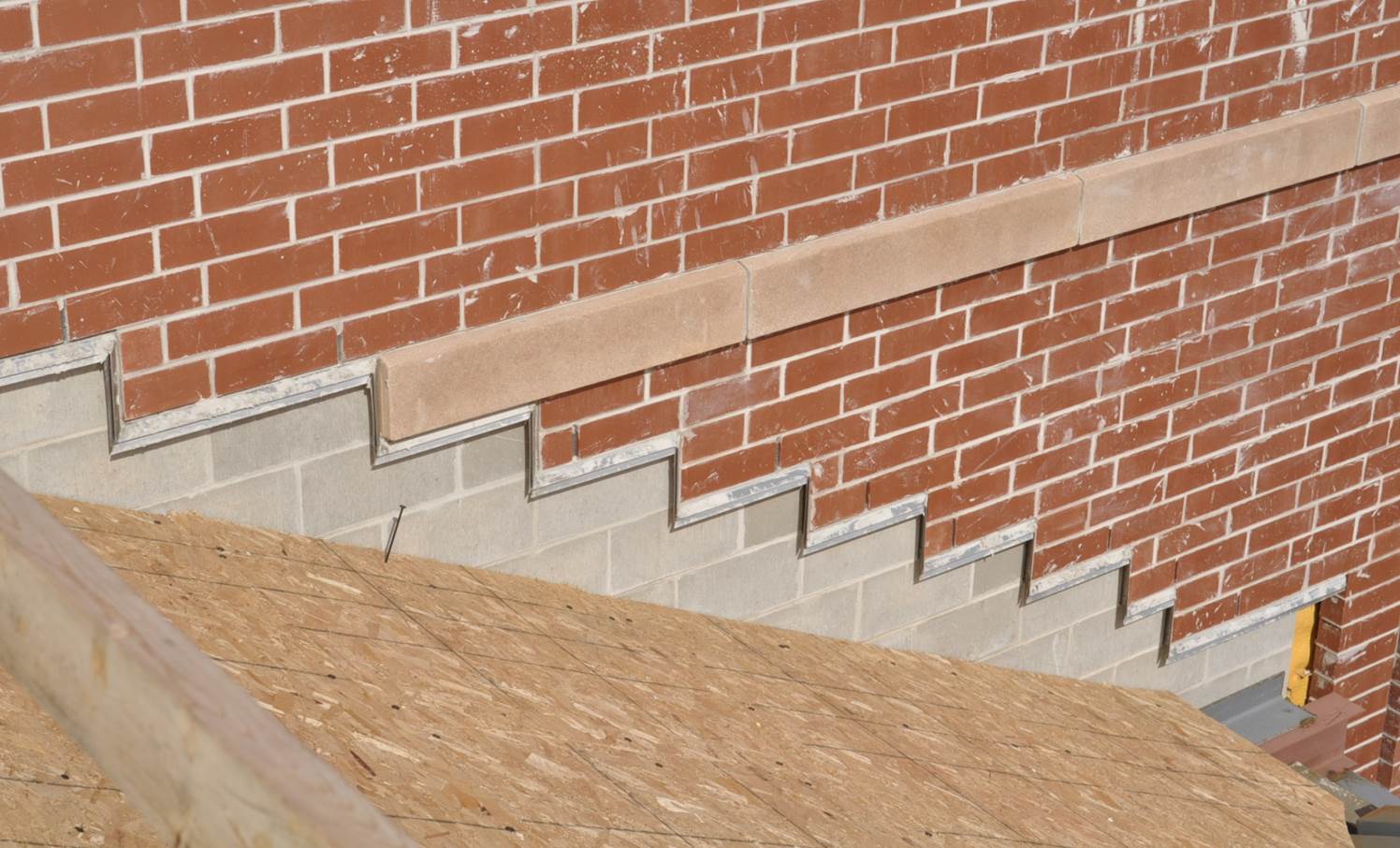 Reducing Risk at Roof-to-Wall Flashing Details